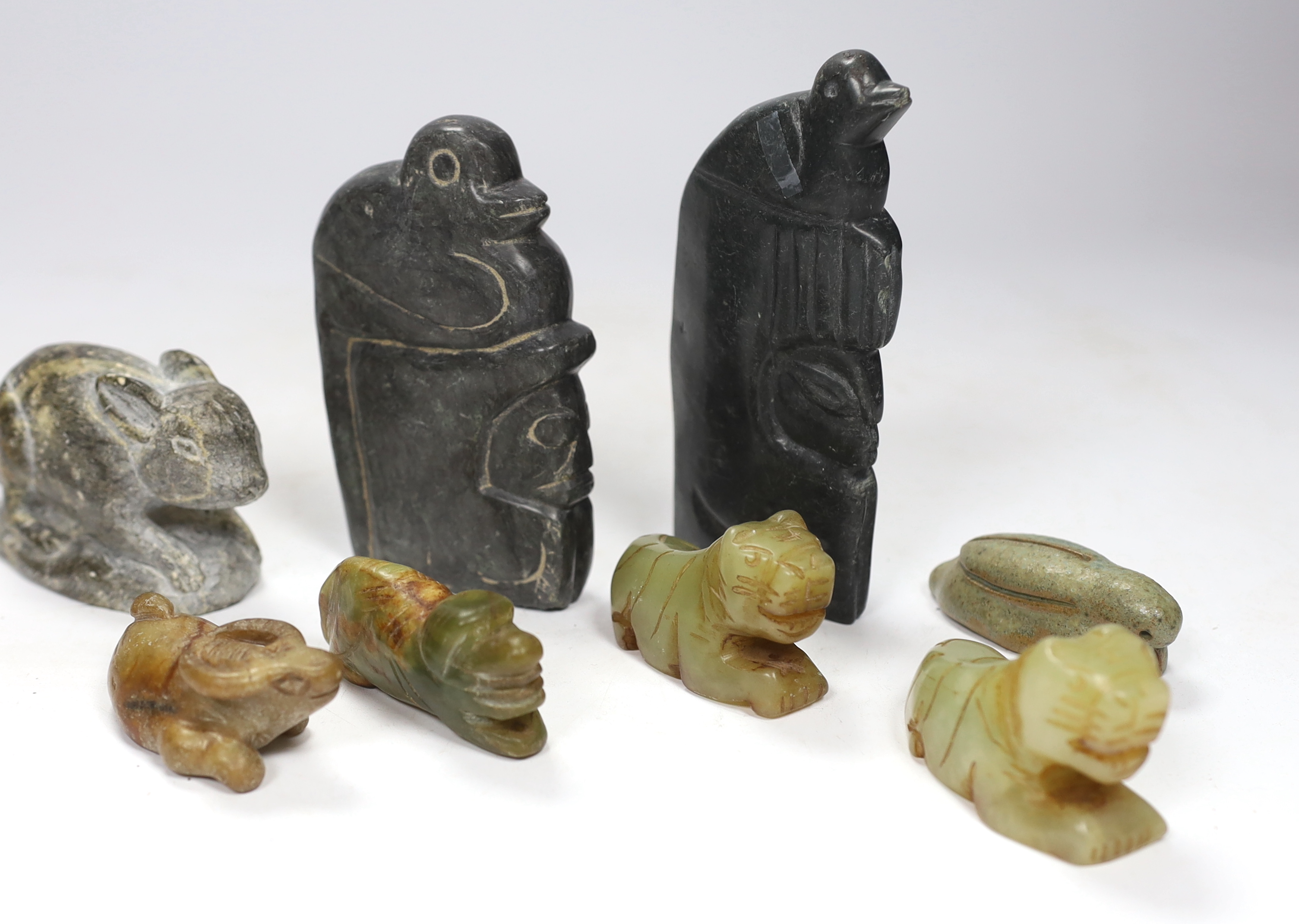 Ten hardstone carvings including Inuit examples, largest 14cm high